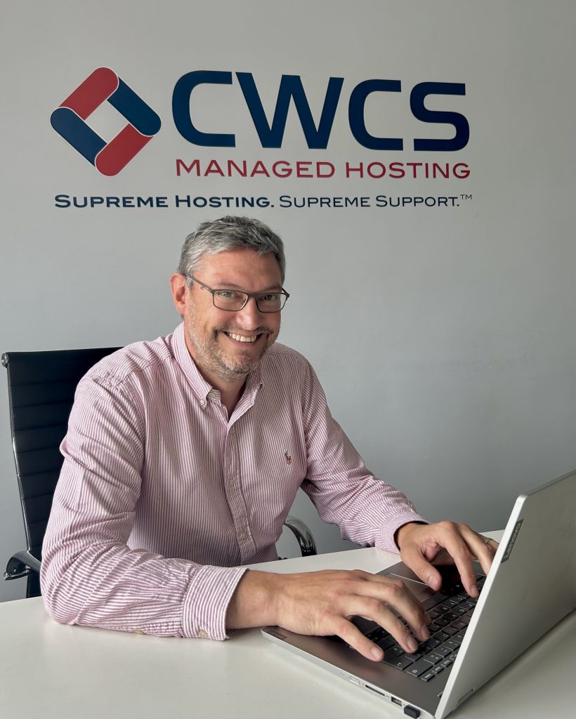 Sales and Marketing Manager, Chris Kemp, sat underneath the CWCS logo.